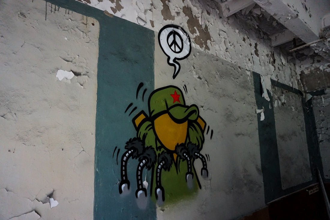 green, brown, and black painting
