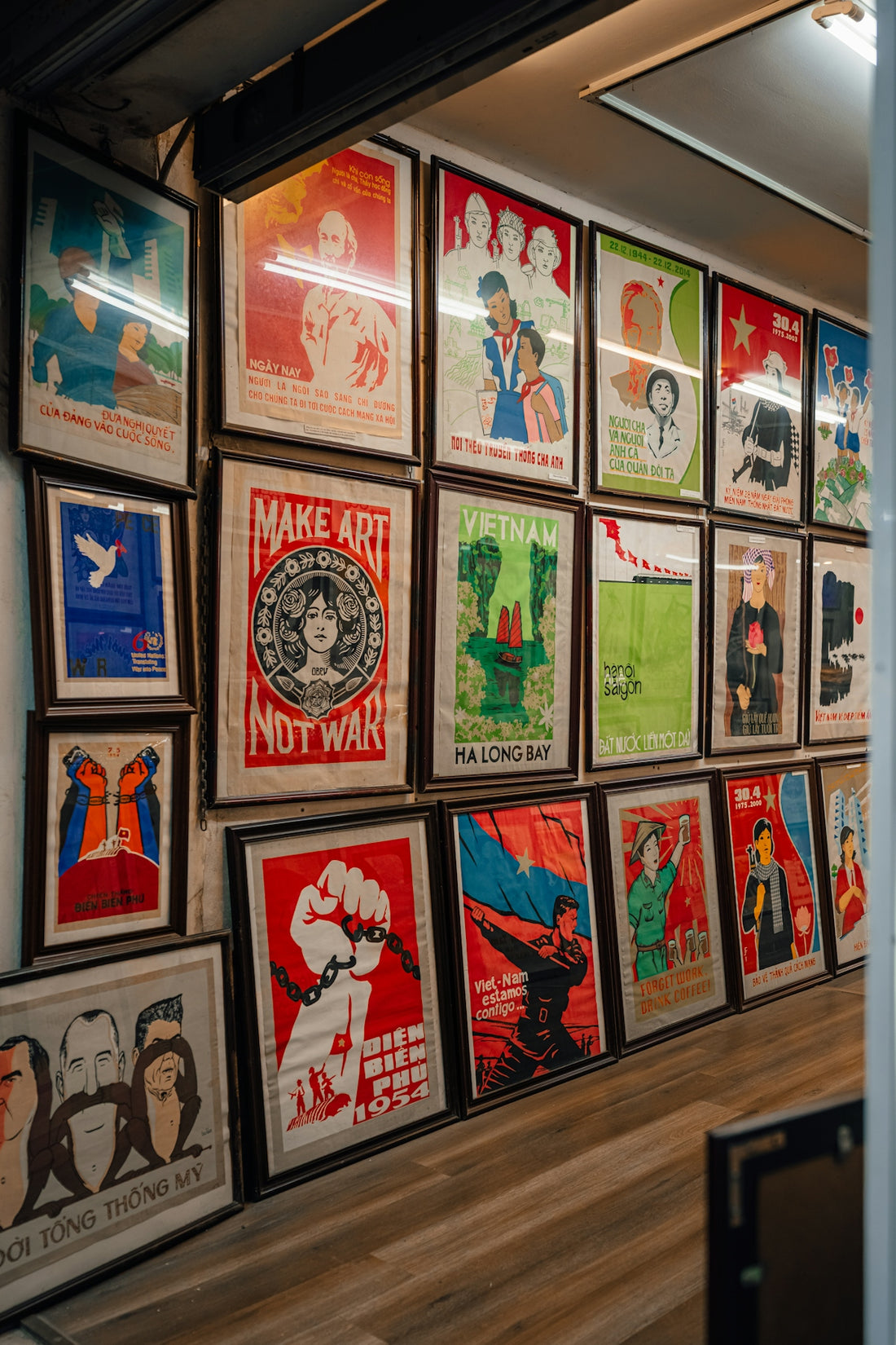 Vintage posters adorn a hallway wall.