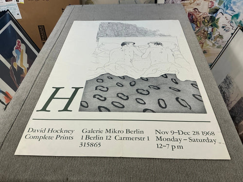 Lithograph exhibition poster by David Hockney featuring two boys aged 23 or 24, showcasing his distinctive artistic style.