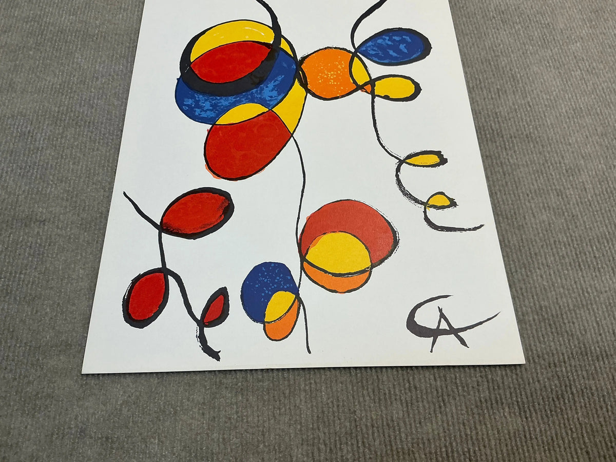 Original Alexander Calder Spirales 1974 abstract lithograph art print showing bold, swirling lines and vibrant shapes in black and white.