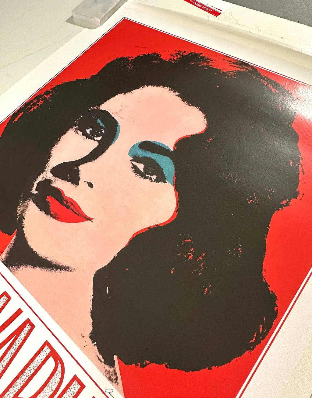 Vintage Andy Warhol Elizabeth Taylor pop art poster from 1989 featuring a colorful portrait of the actress.