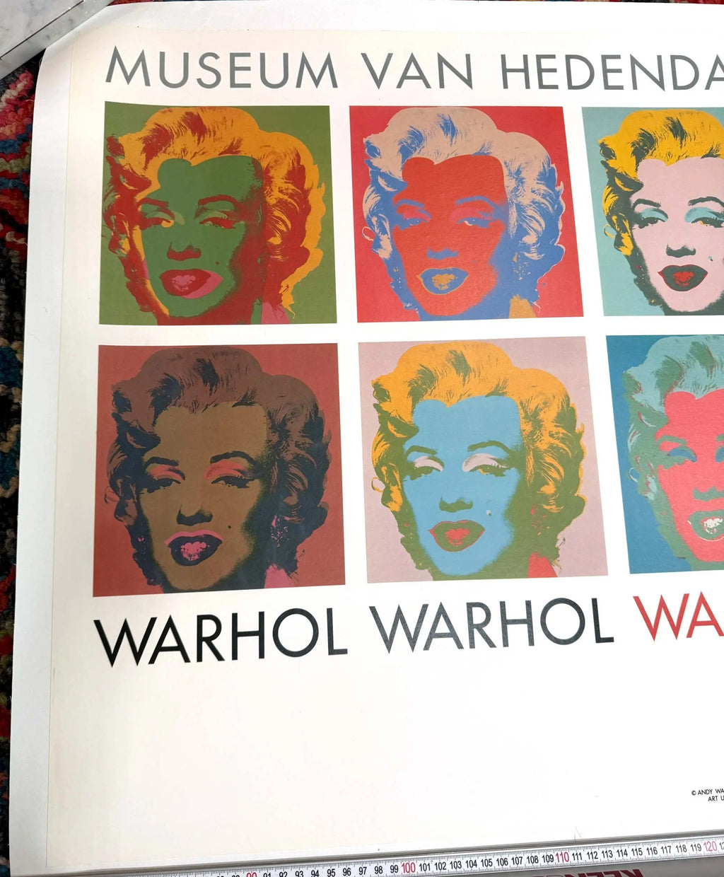 Vintage Andy Warhol 10 Marilyns pop art poster featuring multiple Marilyn Monroe portraits in bold colors.