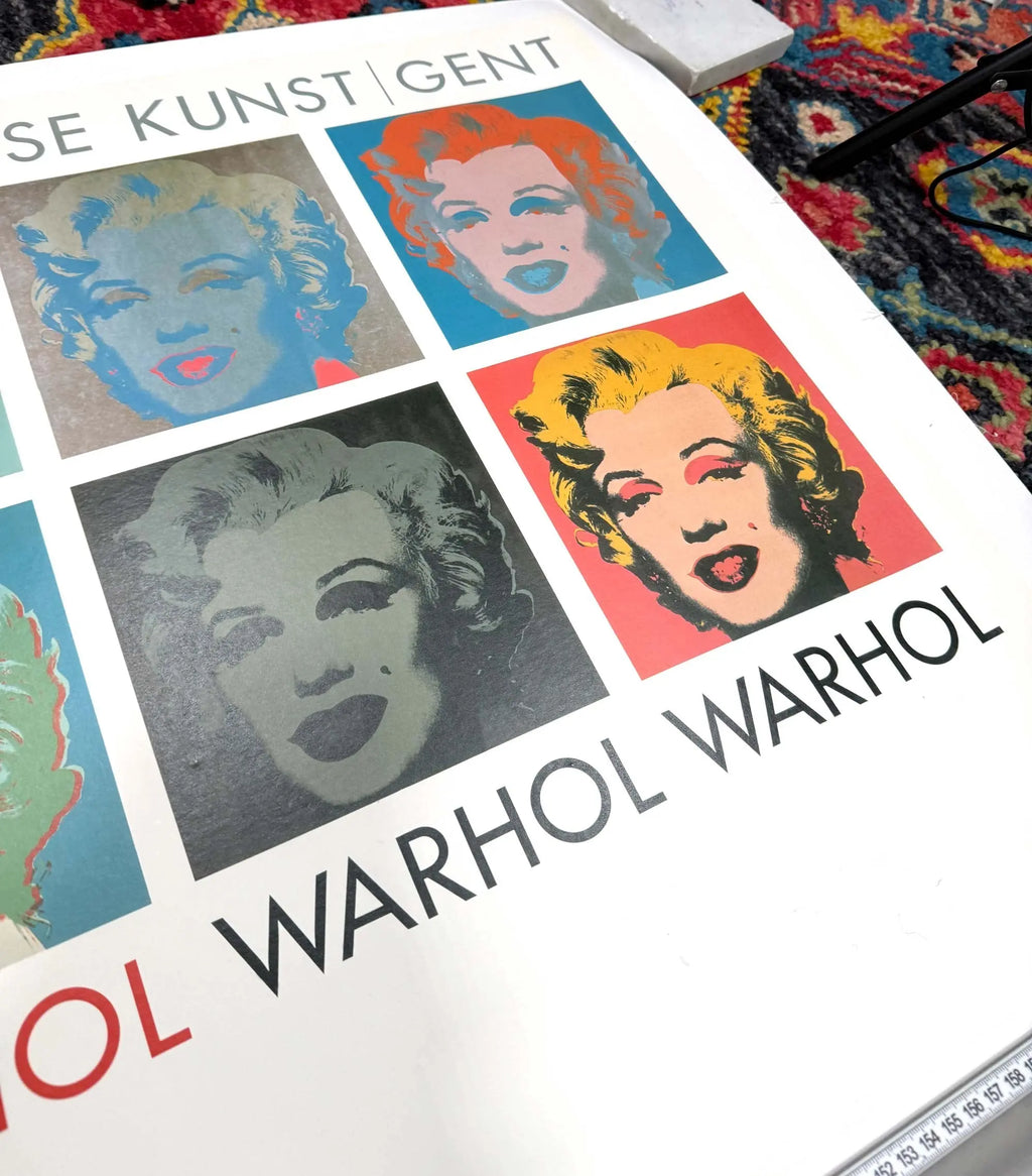 Vintage Andy Warhol 10 Marilyns pop art poster from 1990 featuring colorful Marilyn Monroe images and bold graphic style.