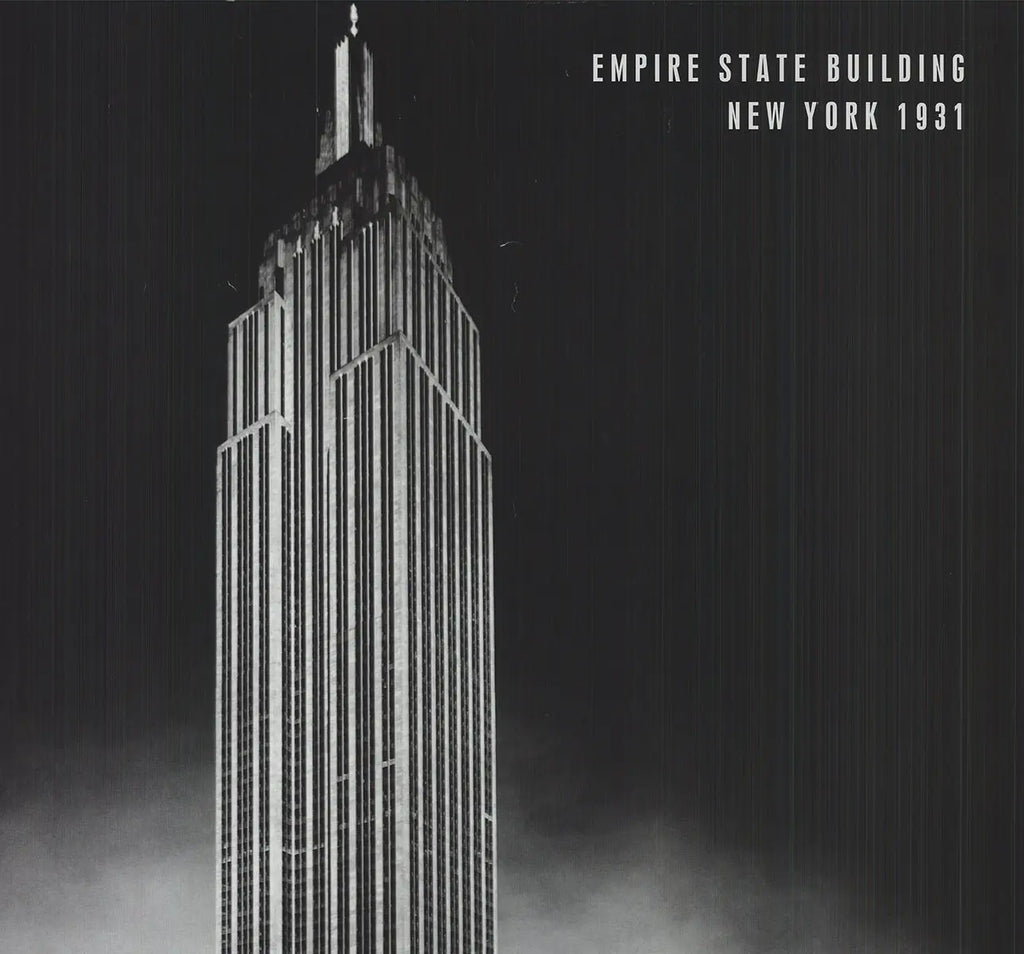 Black and white vintage lithograph poster of the 1931 Empire State Building architecture by an unknown artist.