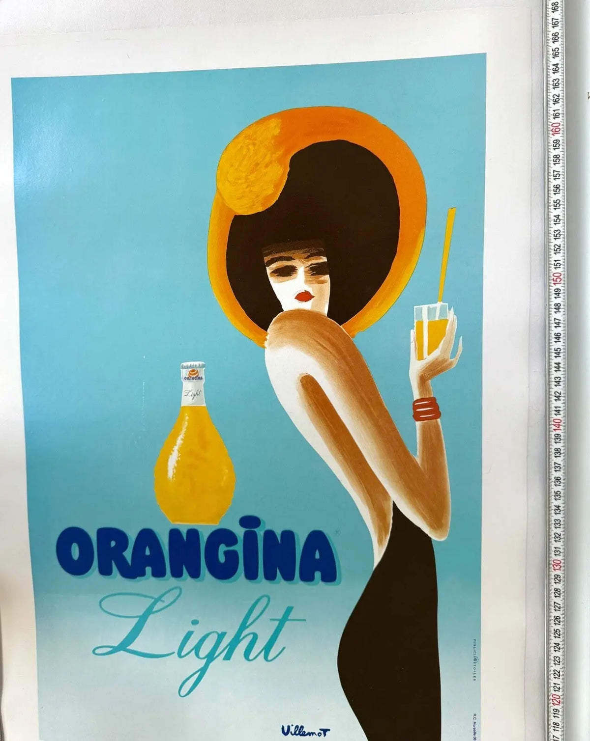 Vintage 1989 Orangina Light poster by Bernard Villemot, linen-backed, featuring vibrant orange and yellow citrus design.