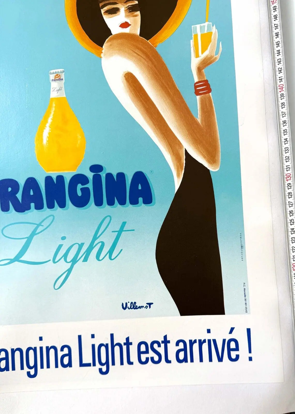 Vintage 1989 Orangina poster by Bernard Villemot, linen-backed design featuring bright citrus imagery and classic branding.