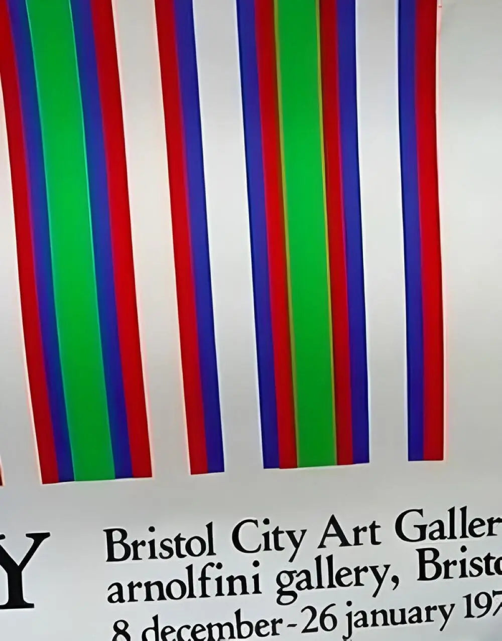 1974 Bridget Riley exhibition poster featuring abstract black and white geometric patterns displayed at the Bristol exhibition.