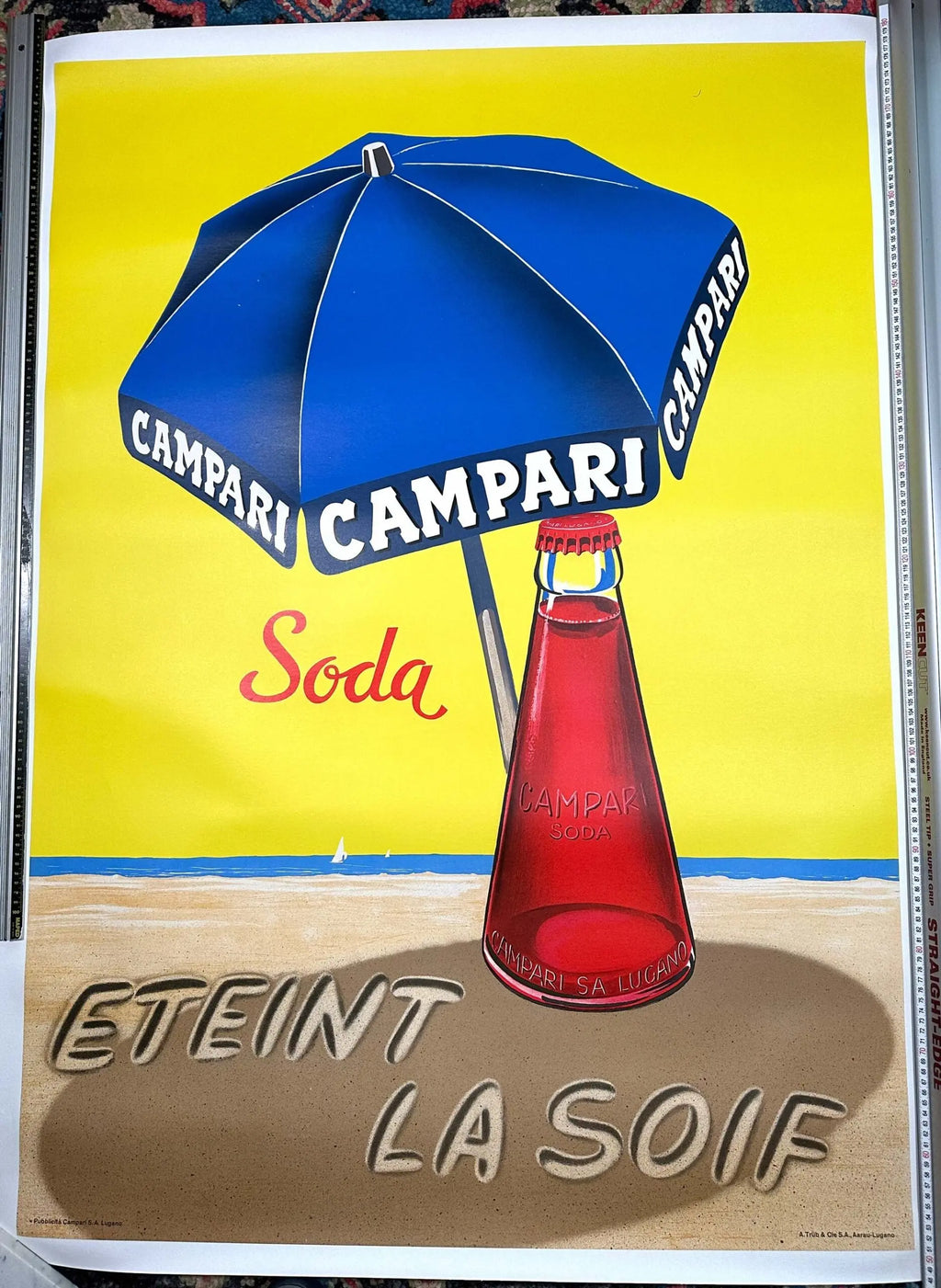Vintage 1963 Campari umbrella lithograph poster on linen, showcasing classic retro artwork and branding.