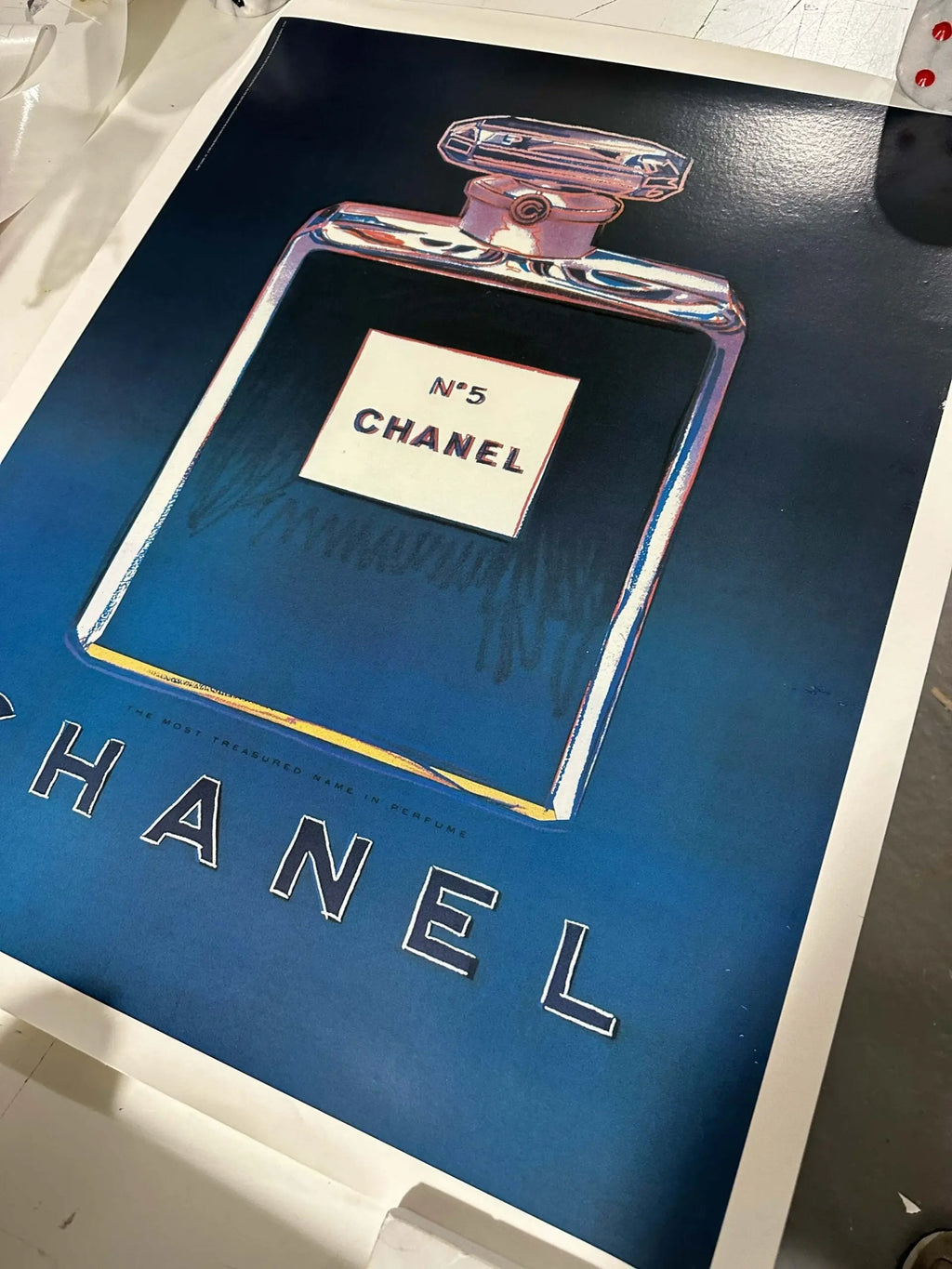 Authentic Andy Warhol Chanel No 5 perfume poster set featuring vibrant pop art designs and classic Chanel branding.