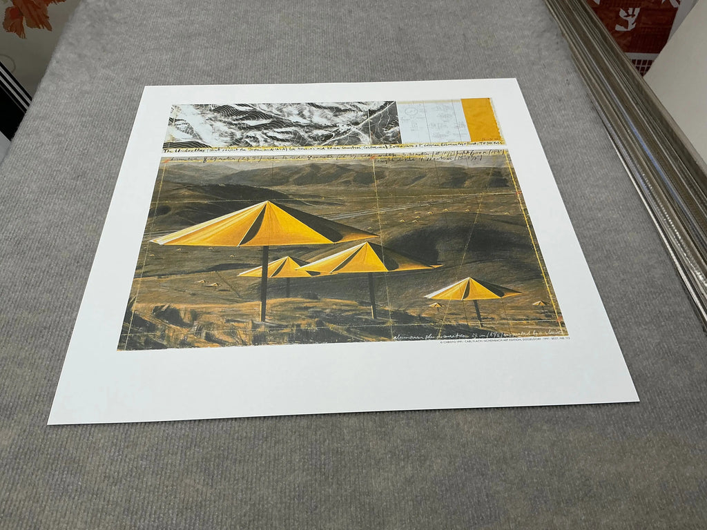 Offset lithograph poster of Christo & Jeanne-Claude's 1991 Yellow Umbrellas exhibition, featuring vibrant yellow umbrella artwork.