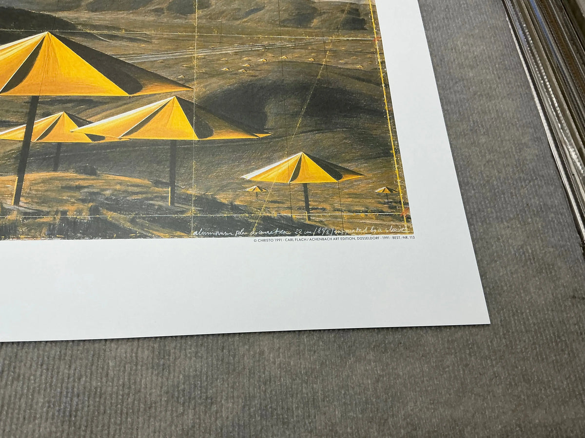 Offset lithograph poster of Christo & Jeanne-Claude's Yellow Umbrellas from 1991 exhibition showing vibrant yellow umbrella imagery.