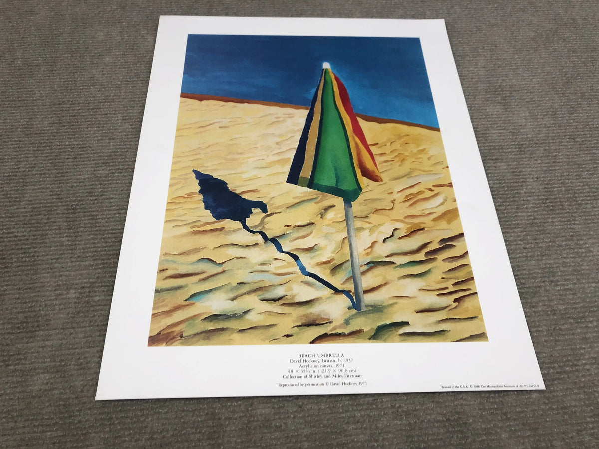 David Hockney beach umbrella print from 1988, artwork displayed at the Metropolitan Museum, featuring vibrant colors and bold design.