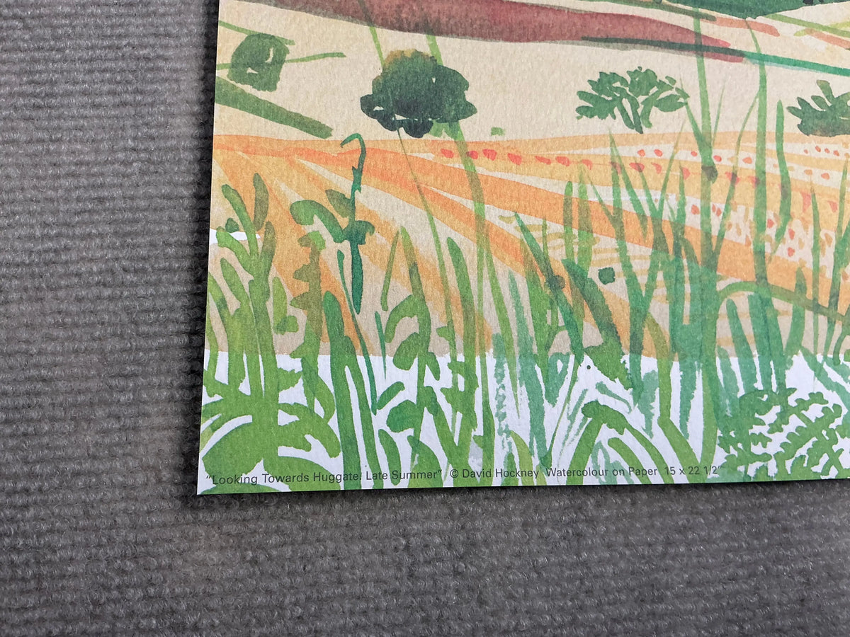 Original David Hockney Yorkshire landscape lithograph poster titled Looking Towards Huggate, depicting scenic countryside in vibrant colors.