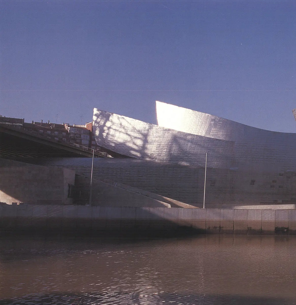 Architectural photography art print of Frank Gehry's Guggenheim Bilbao building from 1997, showcasing its distinctive design and structure.