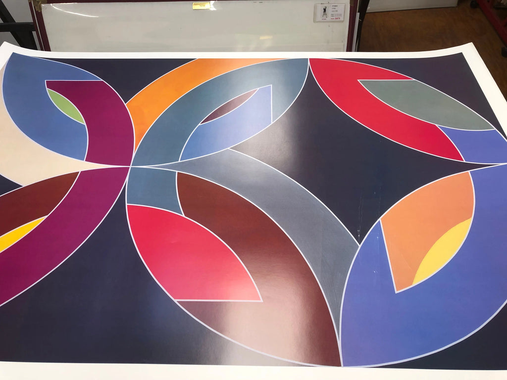 Frank Stella Lac Laronge IV 1986 offset lithograph abstract art poster showcasing bold geometric shapes and vivid colors.
