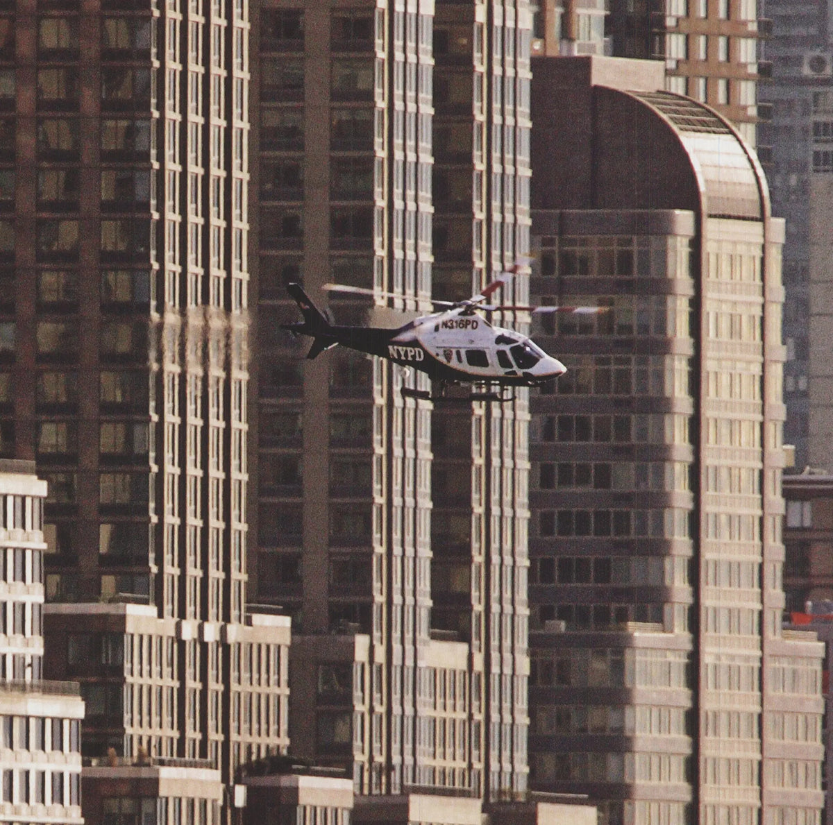 Hank Gans New York Helicopter 2007 cityscape offset lithograph poster showing a detailed aerial view of NYC skyline.