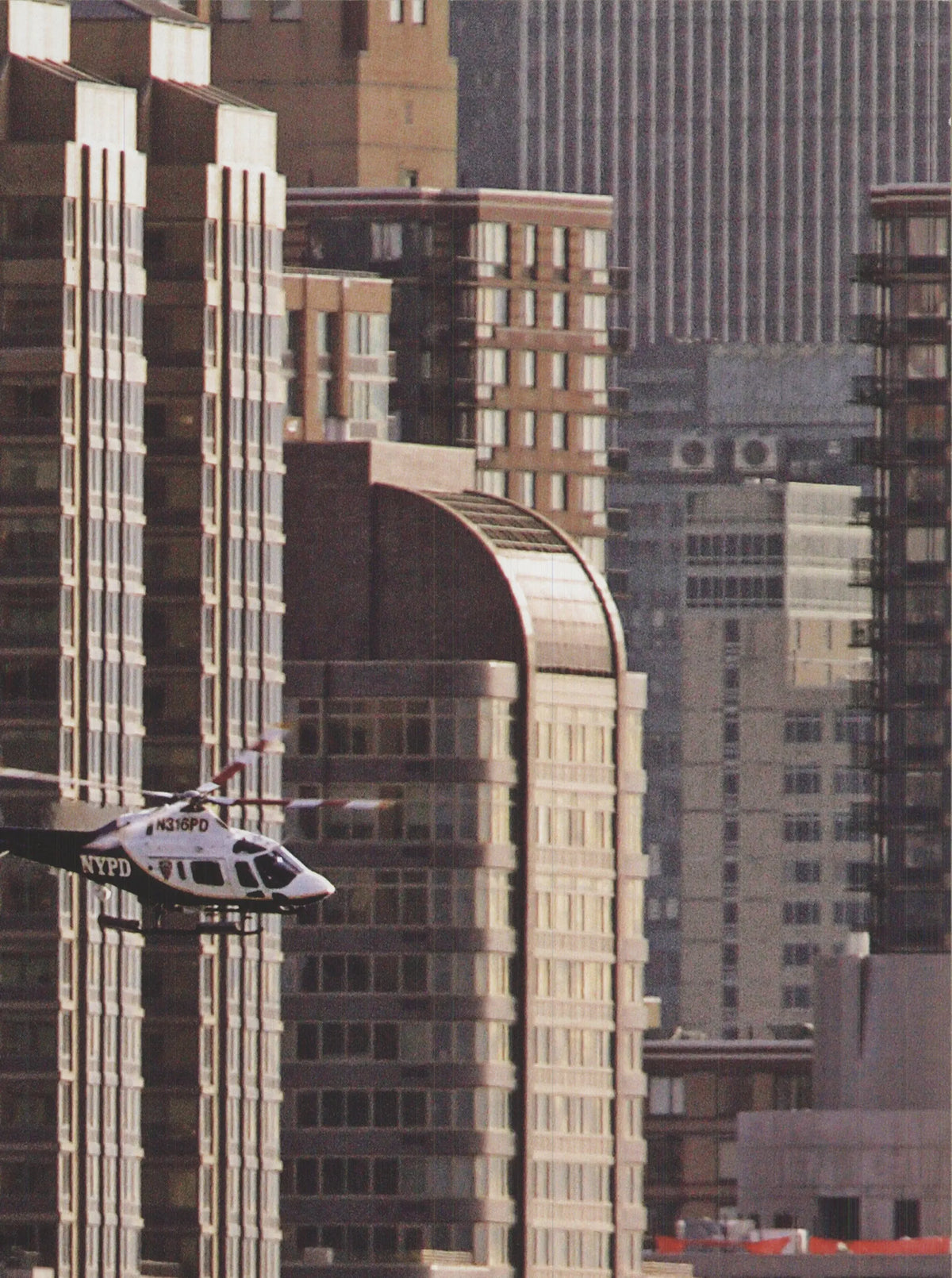 Hank Gans New York City helicopter offset lithograph poster depicting a cityscape with helicopter in the sky.