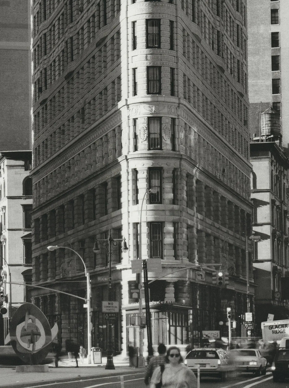 Henri Silberman vertical art poster of the Flatiron Building in New York from 1998, showcasing city architecture.