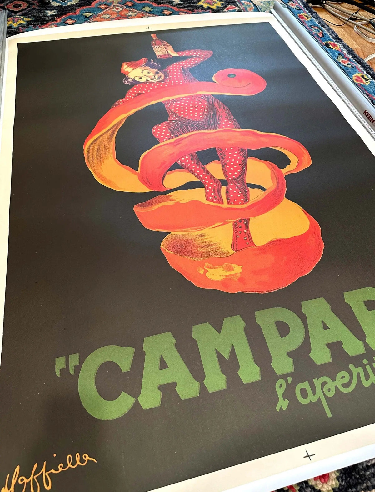 Vintage 1950s Campari L’Aperitivo poster by Leonetto Cappiello, colorful illustration with bold text and retro design elements.