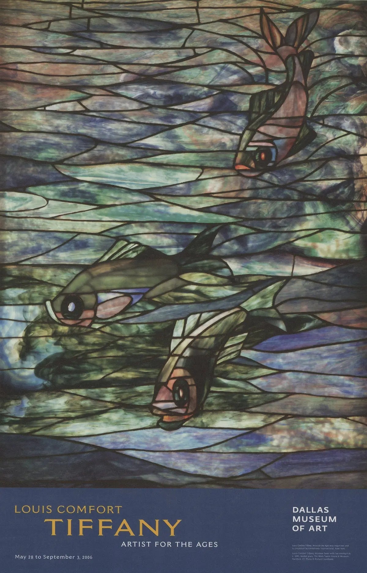 Louis Comfort Tiffany stained glass art poster featuring colorful swimming fish in an exhibition display.