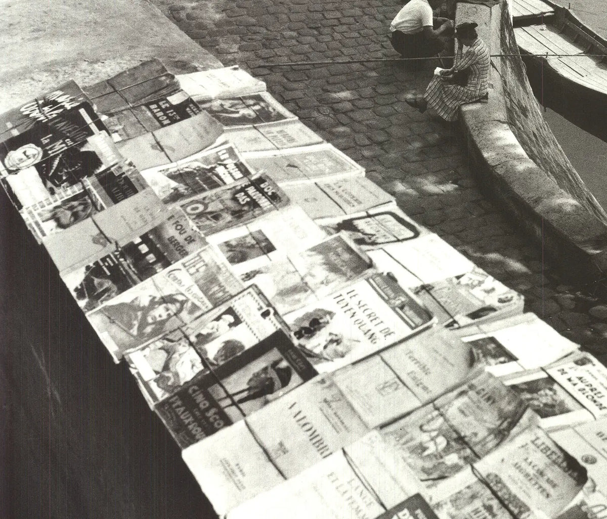 Louis Stettner Sur Les Quais 1988 vintage photography poster art print showing a city waterfront scene with moored boats and buildings