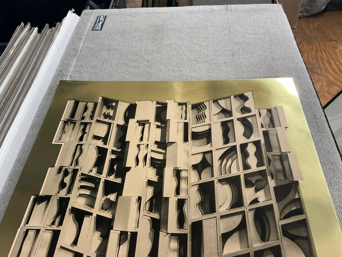 Louise Nevelson Gold Dust and Shadows 1977 foil print poster featuring abstract gold and black textured artwork.