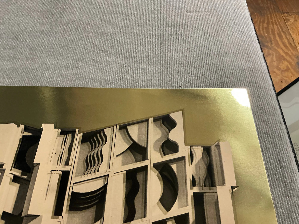 Louise Nevelson Gold Dust and Shadows 1977 foil print poster featuring abstract artwork and metallic gold accents.