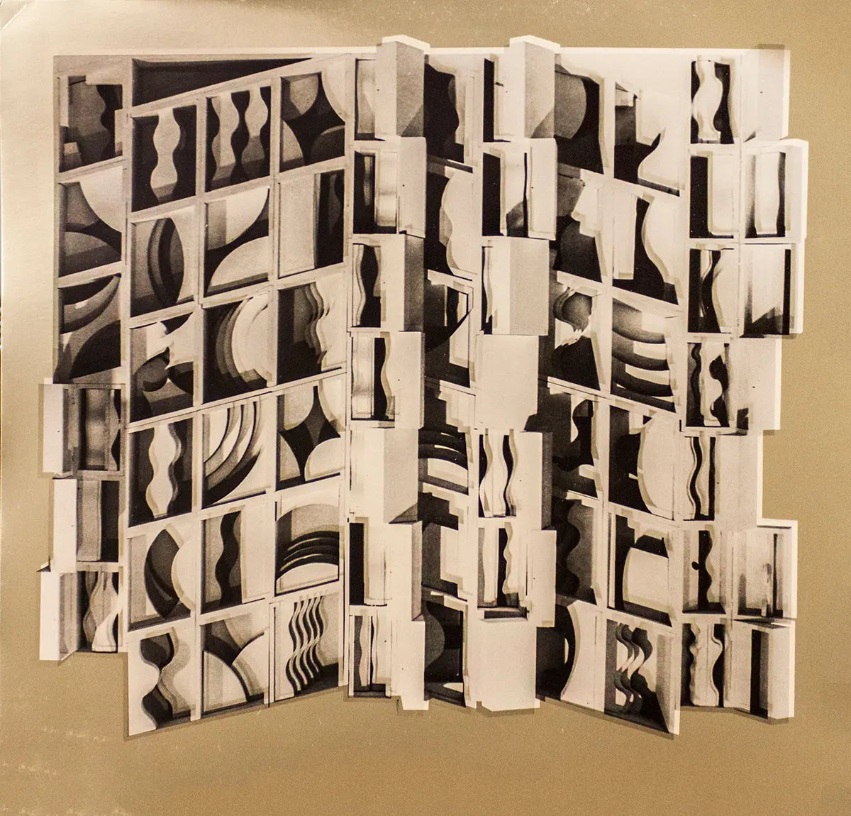 Original Louise Nevelson Lunar Gold 1974 foil art print featuring abstract geometric shapes and metallic gold accents.