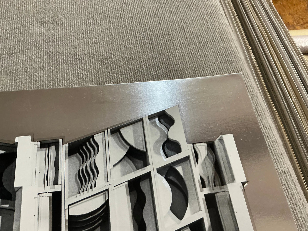 Louise Nevelson Lunar Silence silver foil art print from 1977 showcasing abstract geometric shapes and metallic textures.