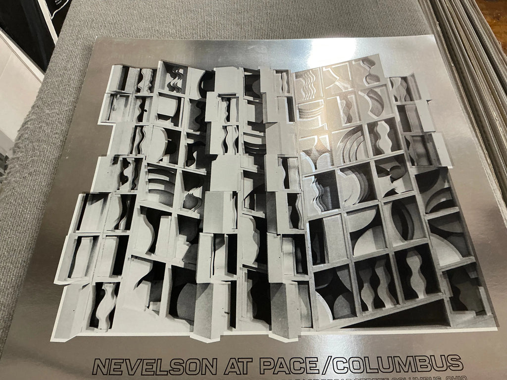 Louise Nevelson Lunar Silence silver foil exhibition art print from 1977, featuring abstract geometric shapes and metallic tones.