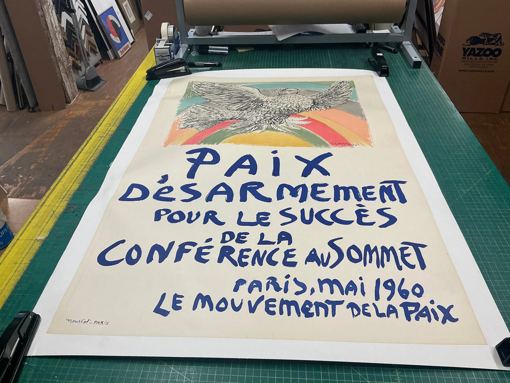 Original 1960 Pablo Picasso lithograph poster titled "Paix Disarmement Peace" from the exhibition, featuring abstract artwork by Picasso.
