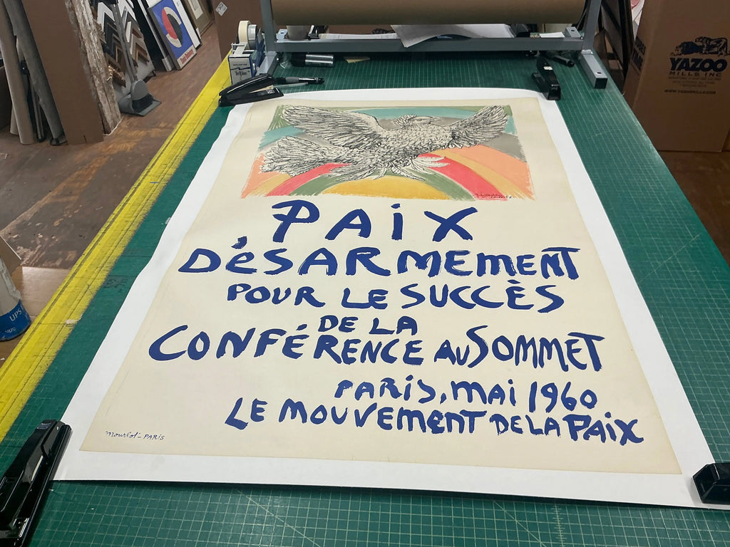 Original 1960 Pablo Picasso lithograph poster titled "Paix Disarmement Peace" featuring artwork from the Picasso exhibition.