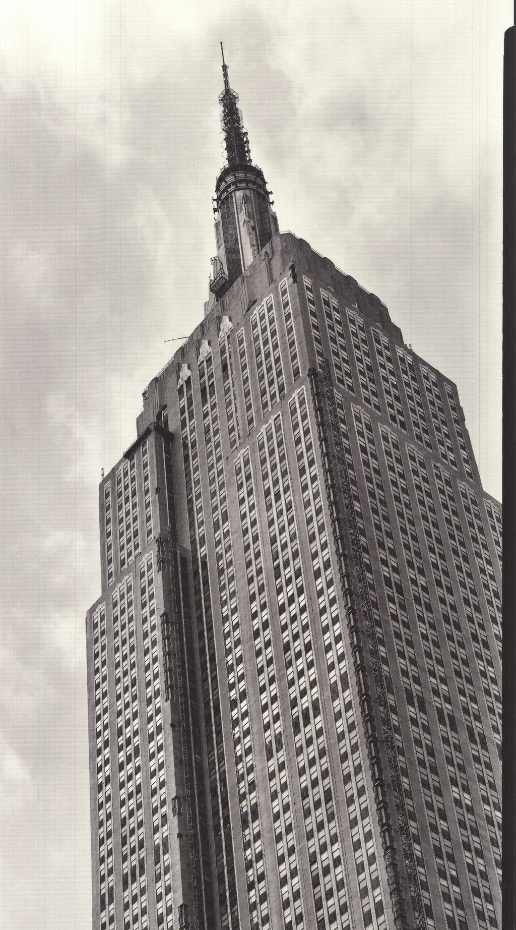 Black and white architecture poster of the Empire State Building by Paula Barr, showcasing detailed building design from 1998.