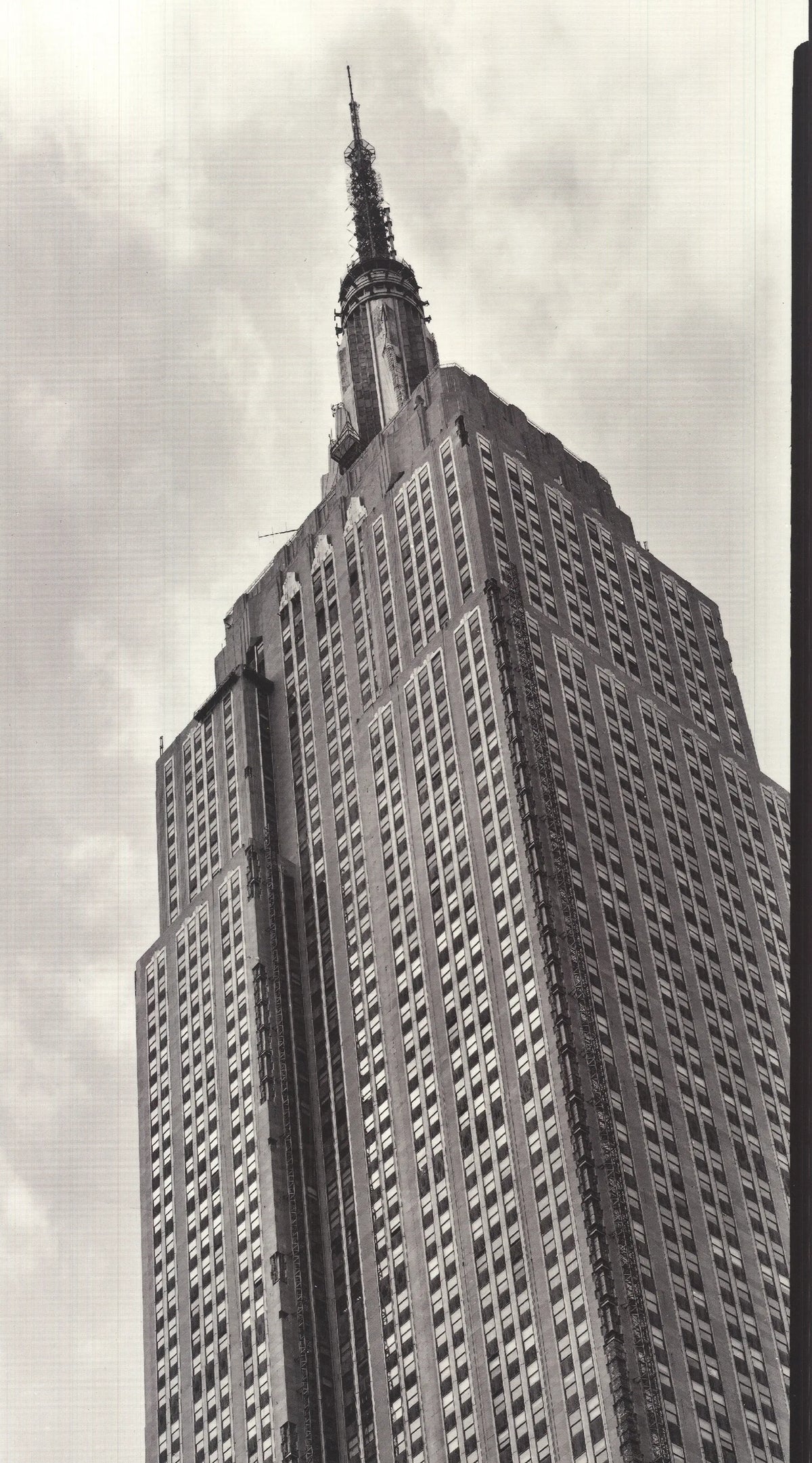 Black and white architecture poster of the Empire State Building by Paula Barr, showcasing detailed building design from 1998.