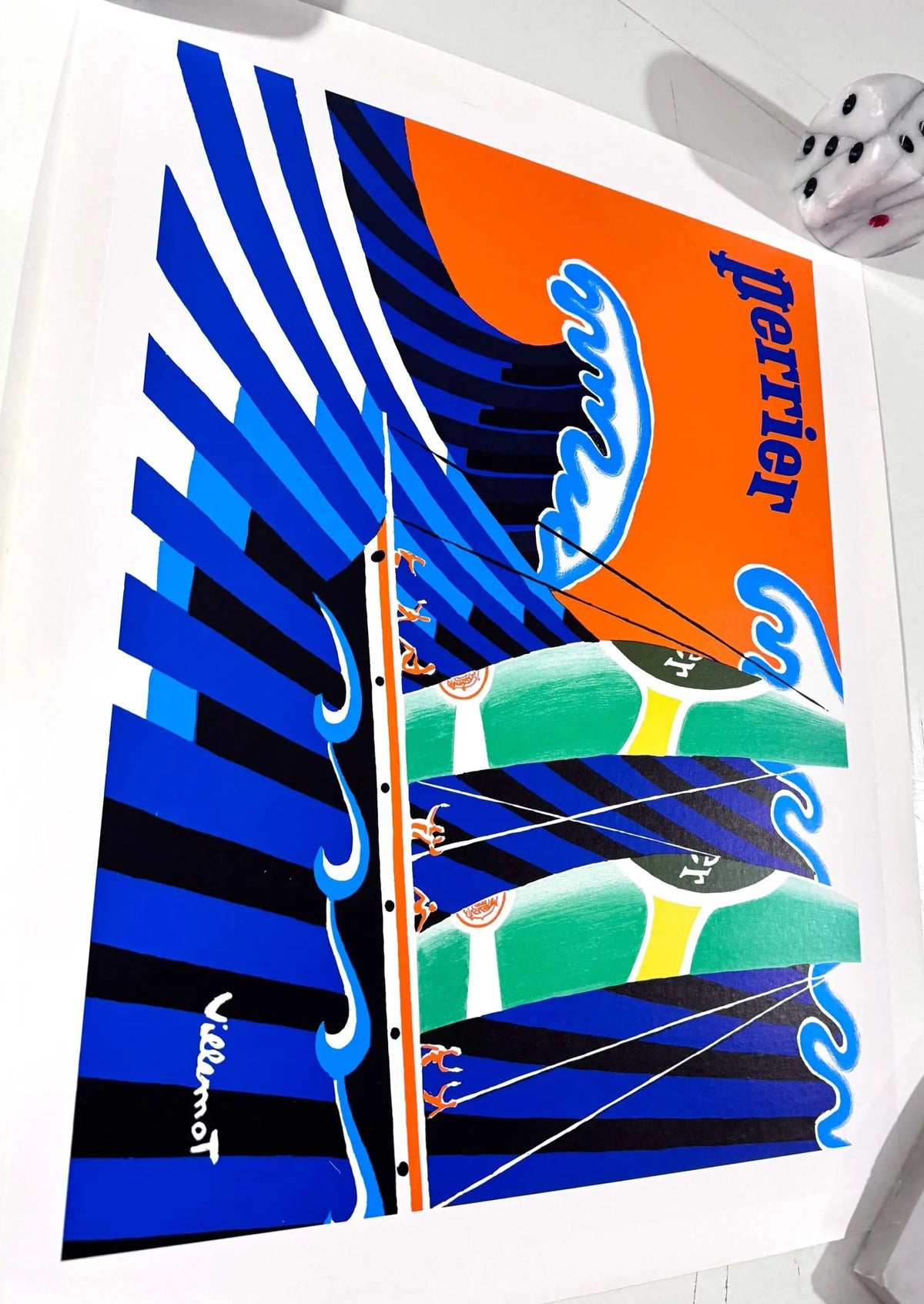 Vintage Perrier poster featuring Bernard Villemot's Hokusai Wave design on linen, created in 1980 with vibrant colors and bold imagery.