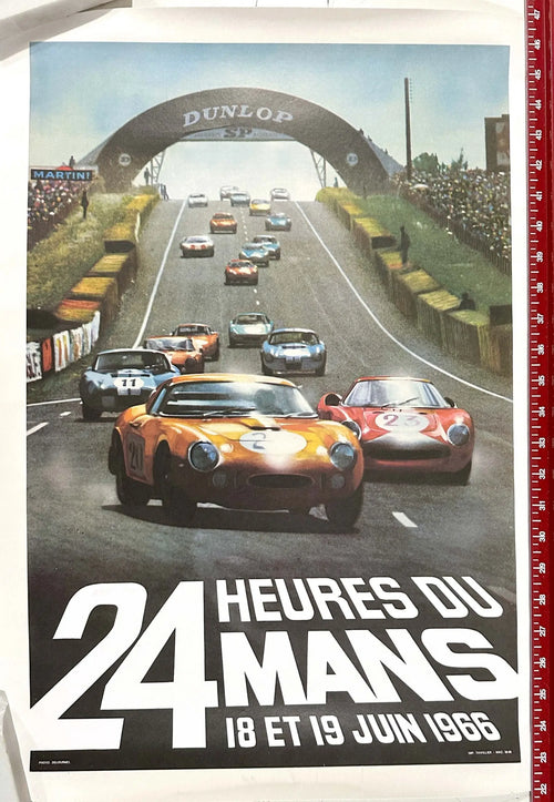 Vintage 1966 Le Mans 24 Hours race poster by André Delourmel, featuring classic race cars and historical Le Mans imagery.