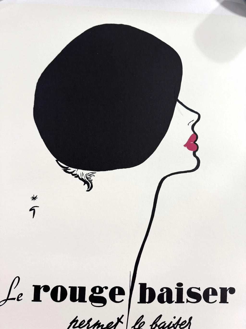 Vintage 1970s René Gruau Le Rouge Baiser fashion poster on linen, featuring bold red lipstick and elegant style.