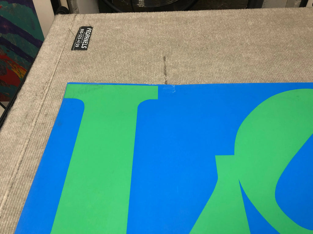 Vintage Robert Indiana LOVE-Stable 1971 serigraph art poster featuring bold text and vibrant colors, original artwork on paper.