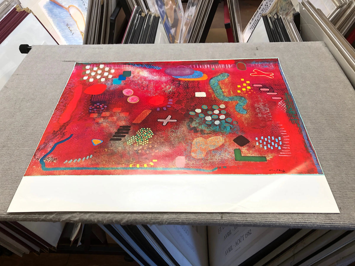 Colorful abstract lithograph by Robert Natkin on exhibition poster, featuring vibrant shapes and bold brushstrokes.