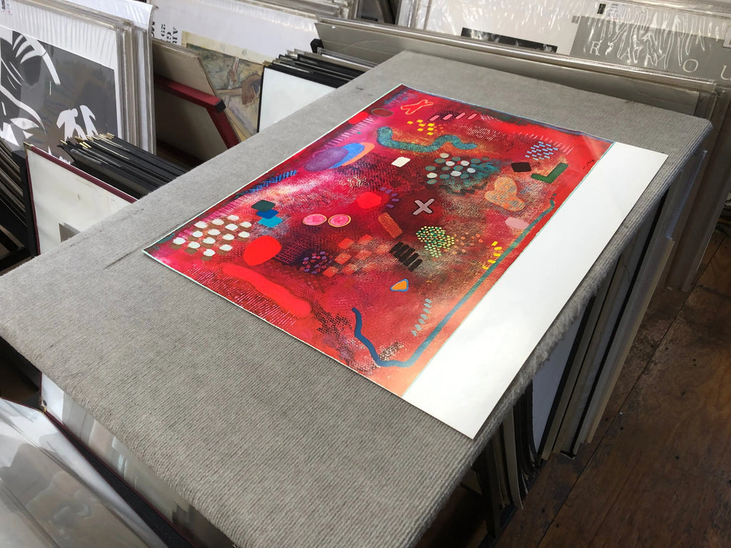 Colorful abstract lithograph by Robert Natkin on exhibition poster, showcasing vibrant shapes and bold artistic design.