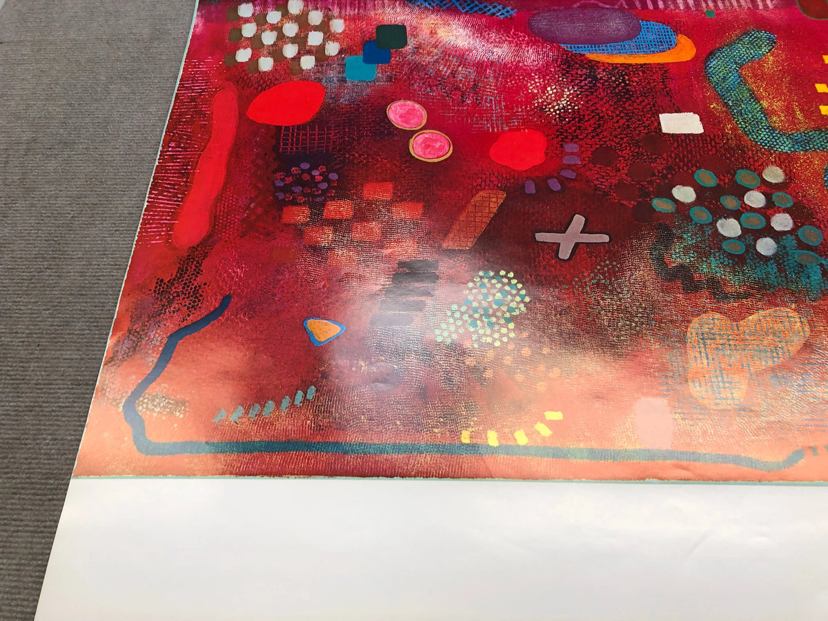 Colorful abstract lithograph by Robert Natkin on display in an exhibition poster, showcasing vibrant shapes and bold artistic style.