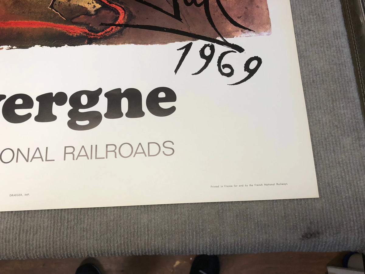 Vintage Salvador Dalí Auvergne 1970 French Railway lithograph poster showing surreal train and landscape artwork.