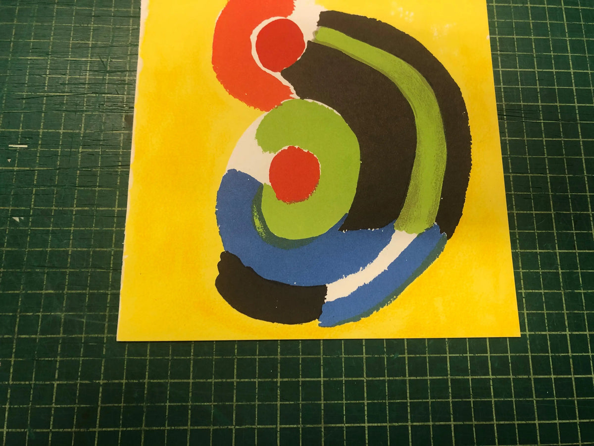 Original Sonia Delaunay lithograph titled "Composition pour XXieme Siecle 1972," featuring abstract geometric designs and vibrant colors.