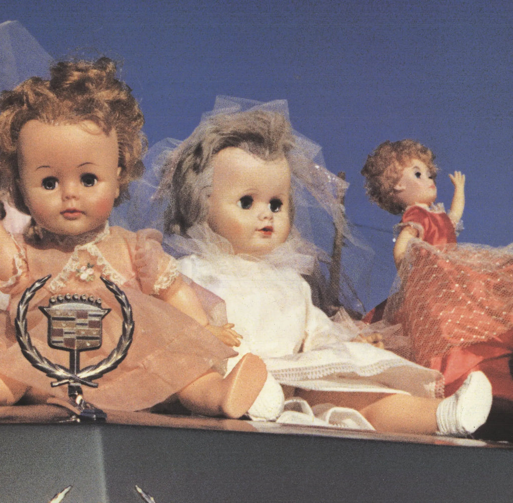 William Eggleston Dolls on a Cadillac 2004 large offset lithograph poster showing colorful dolls on a vintage Cadillac.