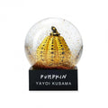 Yayoi Kusama yellow pumpkin snow dome sculpture, limited edition art piece with vibrant colors and intricate design.