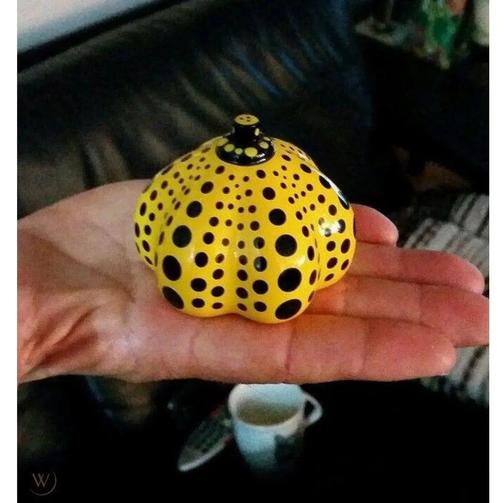 https://images.squarespace-cdn.com/content/v1/624c7514b33b0168ade16519/1655832643673-QQKWE85KPQE06A16UV5U/yayoi-kusama-mini-yellow-pumpkin-paperweight-5.jpg